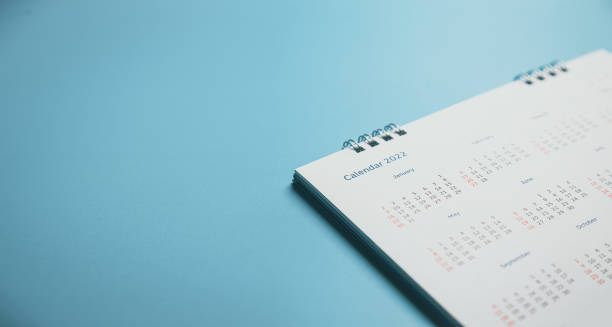 istock Close top view on white calendar 2022 month schedule Work planning and life concept. 1401543769