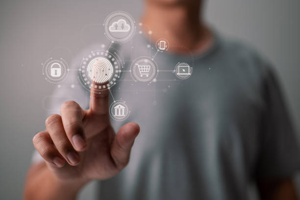 istock An online businessman scans his fingerprint to login to a cloud computing network. 1401543941
