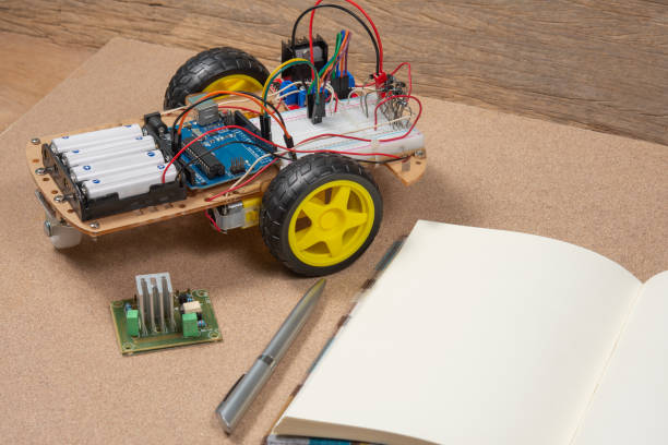 istock Line tracking robot competition ideas. STEM education for kids. A robot and an electronic board that can be programmed. 1401544714