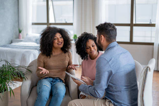 istock Consultant serving clients - including trans women 1401546158