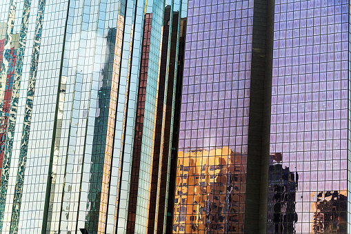 An abstract futuristic reflection of office buildings in Dubai, UAE