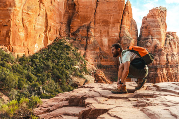 istock Adventurous man enjoying nature and looking at the view 1401546416