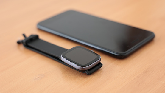 Smartwatch and smartphone communicate via Bluetooth