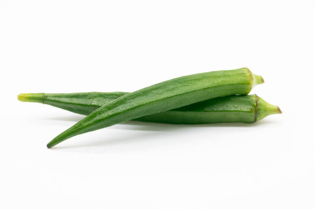 istock okra also known as Lady Finger isolated on white background 1401549517