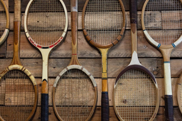 Old Fashioned Vintage and Broken Wooden Tennis Rackets or Racquets