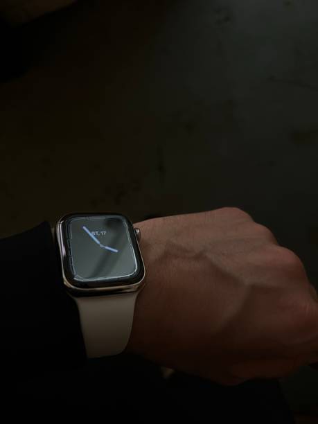 istock hand with smart watch in the dark 1401553736