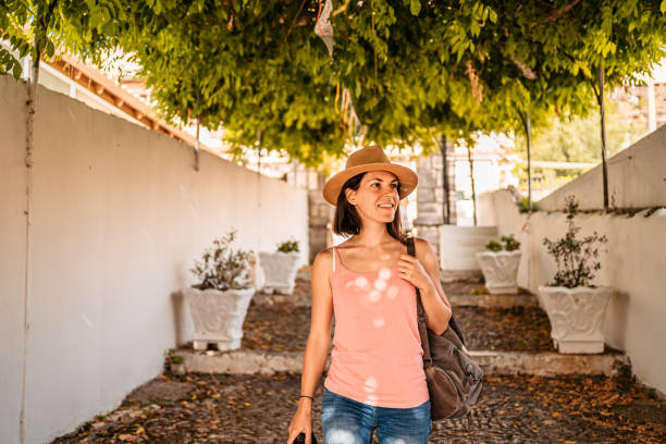 istock Young Female Tourist Exploring Kassiopi 1401557580