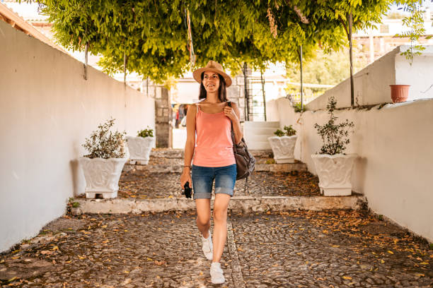 istock Young Female Tourist Exploring Kassiopi 1401557597