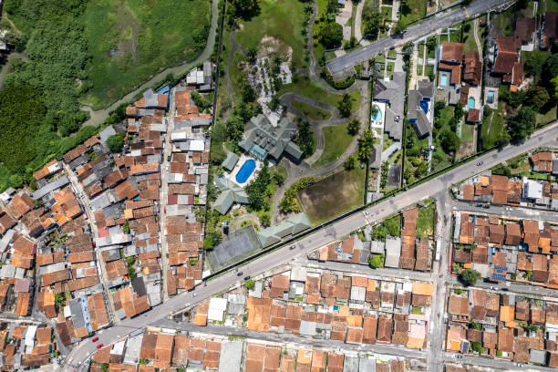 istock Peripheral neighborhood next to luxury condominium 1401557694