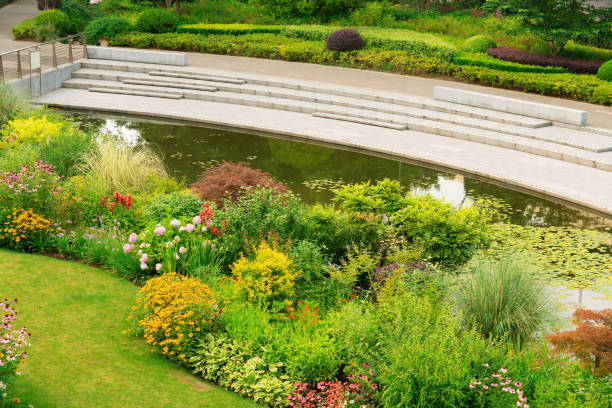 istock Floral plants and marble steps by the pond 1401565854
