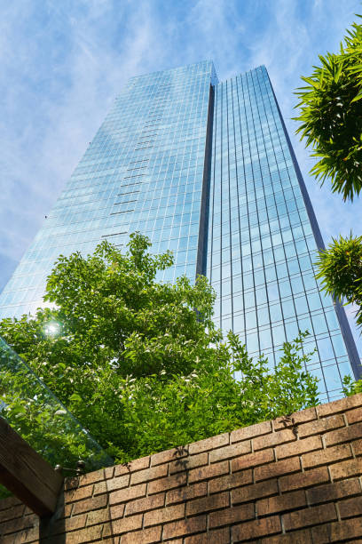 istock High-rise building with blue glass facade looking up 1401566848