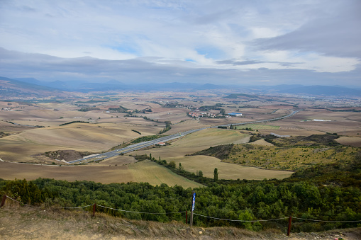 Pamplona, Spain - 6 October 2019: View of the surroundings of Pamplona from the Alto del Perdon (the Mount of Forgiveness), near Pamplona, in the Way of Saint James.