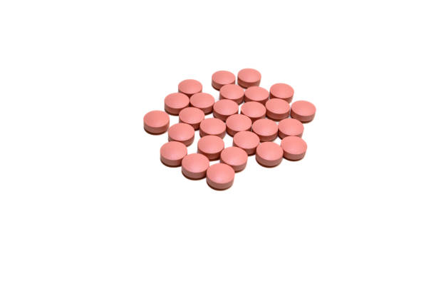 istock A handful of pills on a white background 1401568830