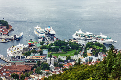 Bergen, Norway - May 30, 2022: Cruise ships in waterfront. Sea passenger Norwegian port