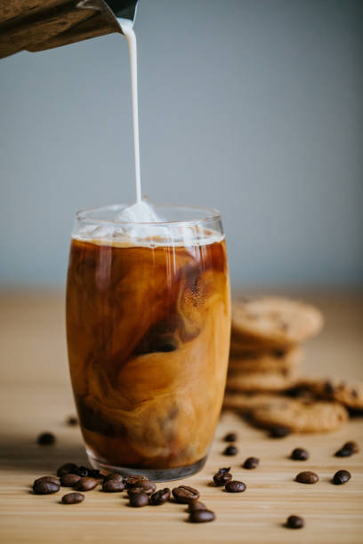 istock Iced latte on wooden table 1401574173