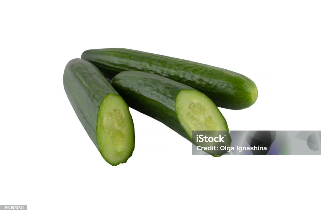 slicing a fresh green cucumber slicing a fresh green cucumber isolated on a white background Color Image Stock Photo slicing a fresh green cucumber slicing a fresh green cucumber isolated on a white background Color Image Stock Photo
