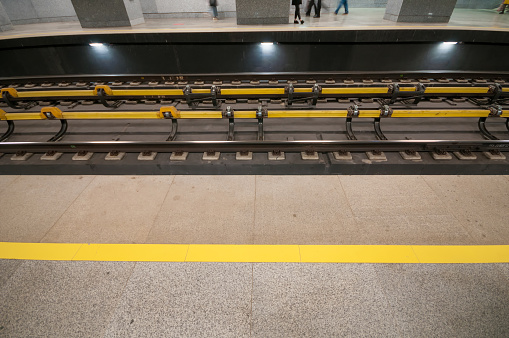 Part of train travel series, picture is depicting people using public transport.