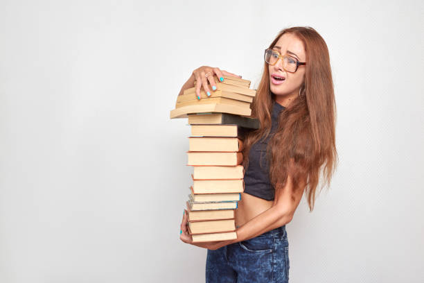 istock girl with books 1401578845