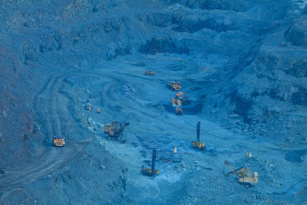 istock The work of large equipment for open-pit mining of iron ore. 1401582578