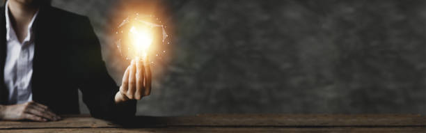 istock Standing woman holding glowing lamp, Creative new idea. Innovation, brainstorming, strategizing to make the business grow and be profitable. Concept execution, strategy planning and profit management. 1401585306