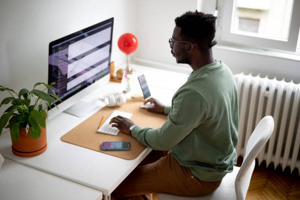 istock Male freelancer working from home 1401585720