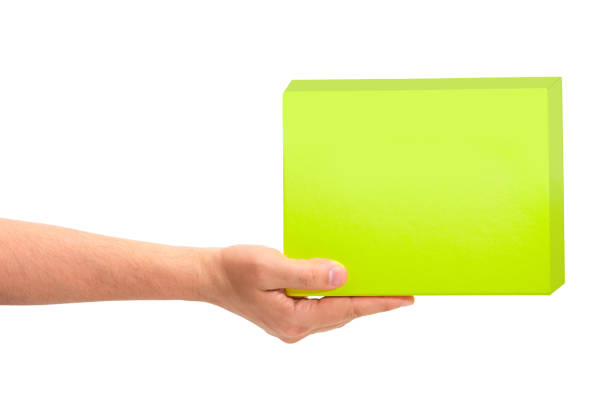 istock Gift green box in male hand, isolated on white background 1401587057