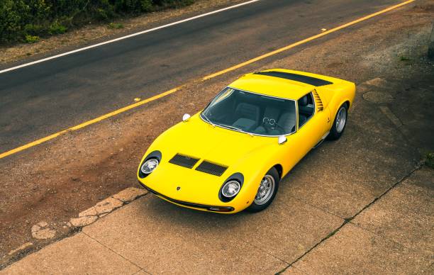 Yellow Lamborghini Miura San Fran, CA, USA
11/2/2021
Yellow Lamborghini Miura parked on the side of the road with a yellow line on the road lamborghini miura stock pictures, royalty-free photos & images