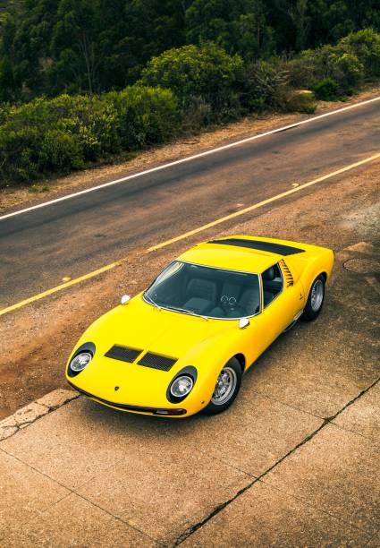 Yellow Lamborghini Miura San Fran, CA, USA
11/2/2021
Yellow Lamborghini Miura parked on the side of the road with a yellow line on the road lamborghini miura stock pictures, royalty-free photos & images