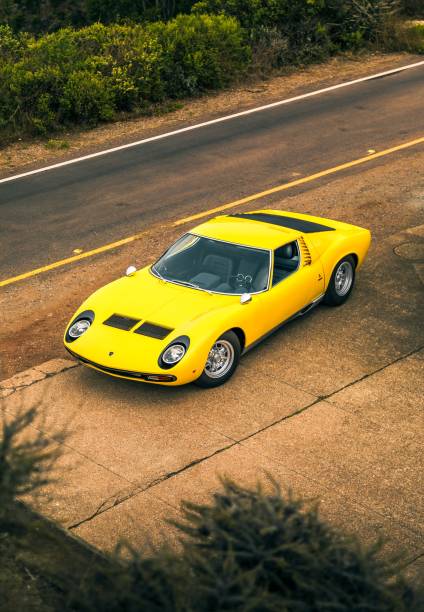 Yellow Lamborghini Miura San Fran, CA, USA
11/2/2021
Yellow Lamborghini Miura on the side of the road viewed from above lamborghini miura stock pictures, royalty-free photos & images