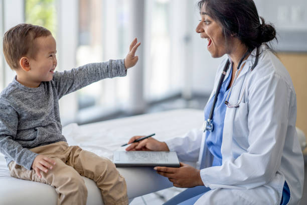 istock Pediatrician Meeting with a Little Boy 1401597760