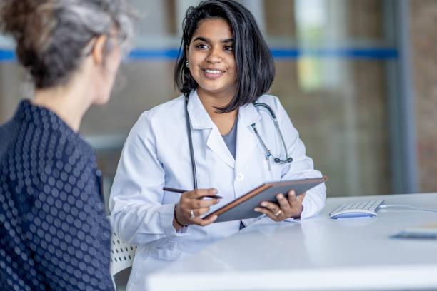 istock Doctor Meeting with a Patient 1401597816