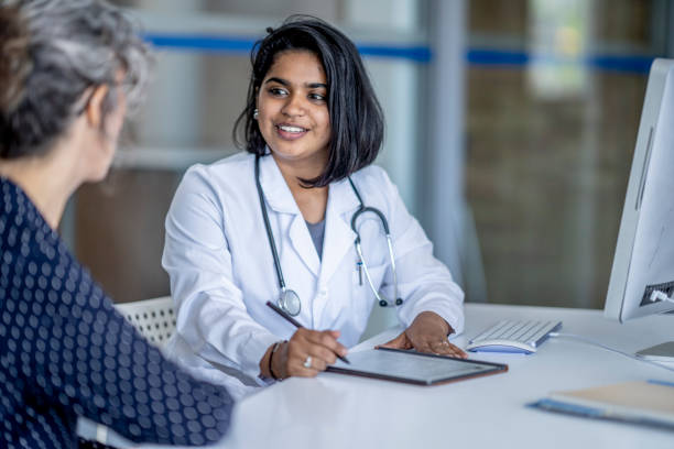 istock Doctor Meeting with a Patient 1401597825