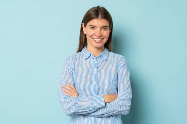 istock Successful confident businesswoman looking at camera over blue studio background 1401601711