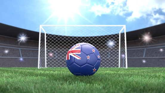 Soccer ball in flag colors on a bright sunny stadium background. New Zealand. 3D image