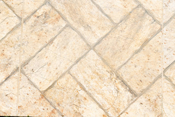 istock Tile texture with orange and cream coloring. Top view. 1401604446