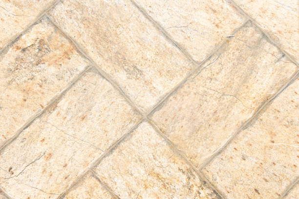 istock Tile texture with orange and cream coloring. Top view. 1401604450