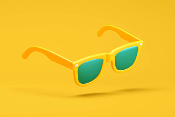 istock Yellow sunglasses on yellow background 1401607750