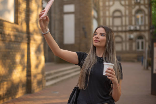 istock Happy woman using phone stock photo 1401609142