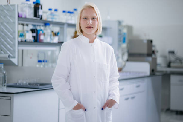 istock Female scientist standing in her laboratory 1401611605