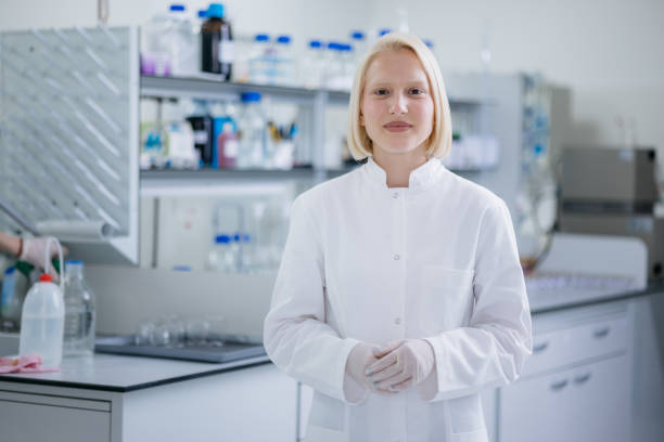 istock Female scientist standing in her laboratory 1401611622