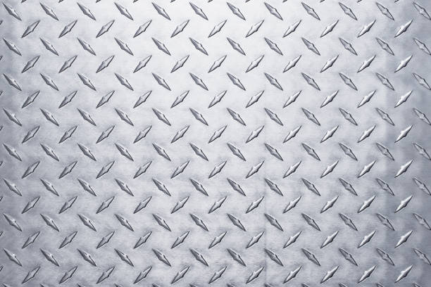 istock light aluminum plate background, silver metal with a diamond texture. 1401611732