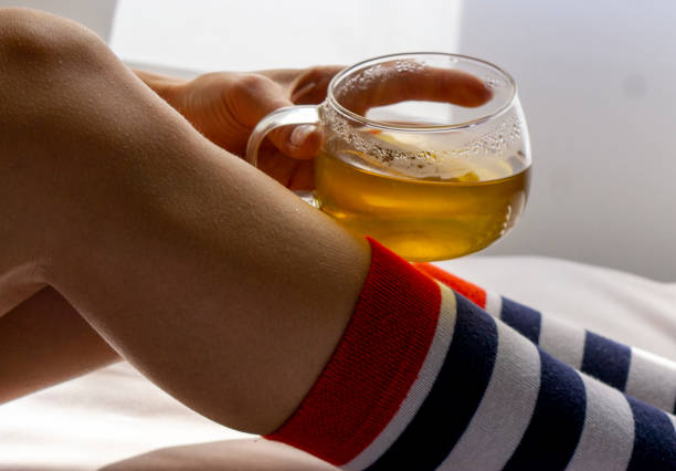 istock woman wearing striped socks 1401613791