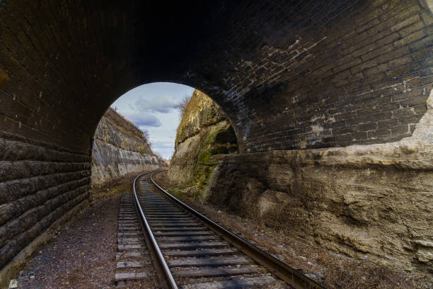 Railway tunnel in the canyon. Background with copy space