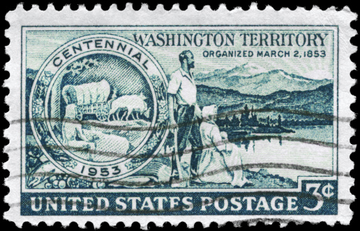 A block of four 15 cent United States postage stamps issued in 1978 featuring four various trees.