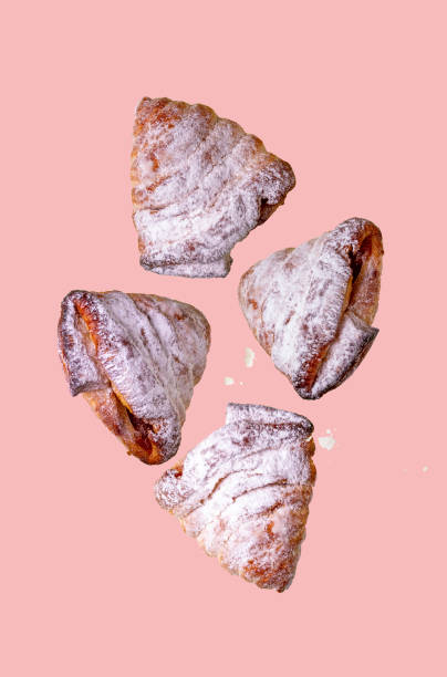 istock homemade buns with jam, sprinkled with powdered sugar, flying food,selective focus 1401621806