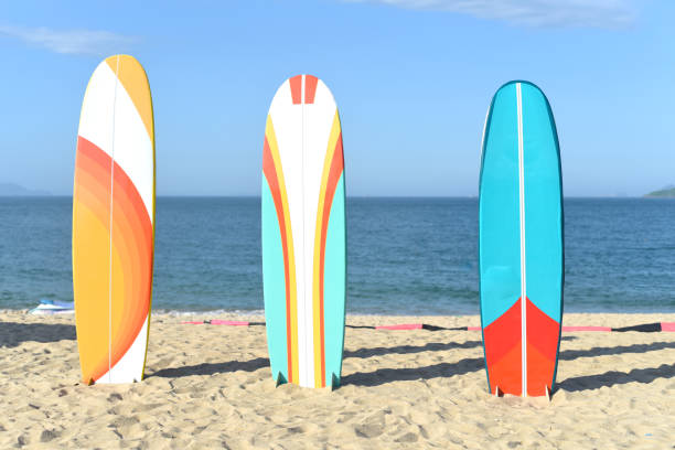 Surfboards on sandy beach in Vietnam stock photo