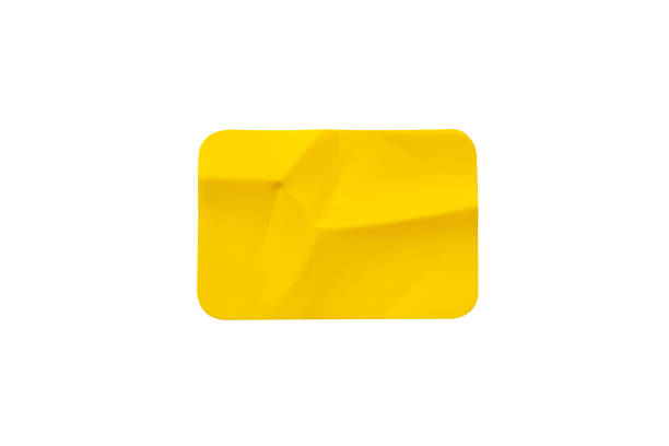 istock Yellow plastic sticker label isolated on white background 1401629886