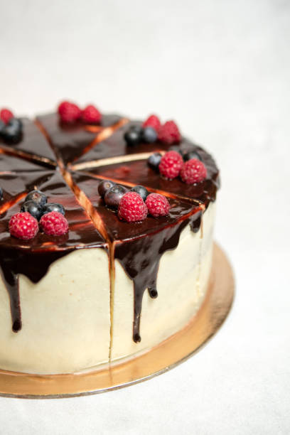 istock Cheese cake with chocolate and berries. Close up. 1401630078