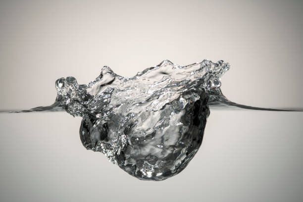 istock Splashes of water on a gray background 1401633720
