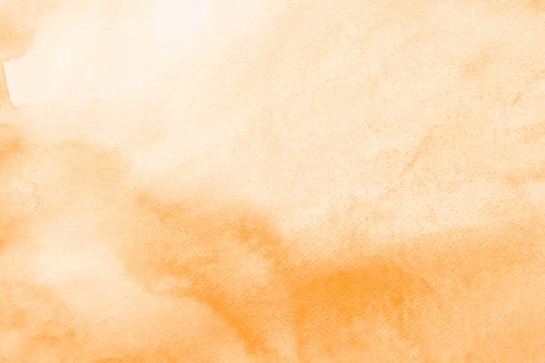 istock orange painted watercolor background texture 1401643539